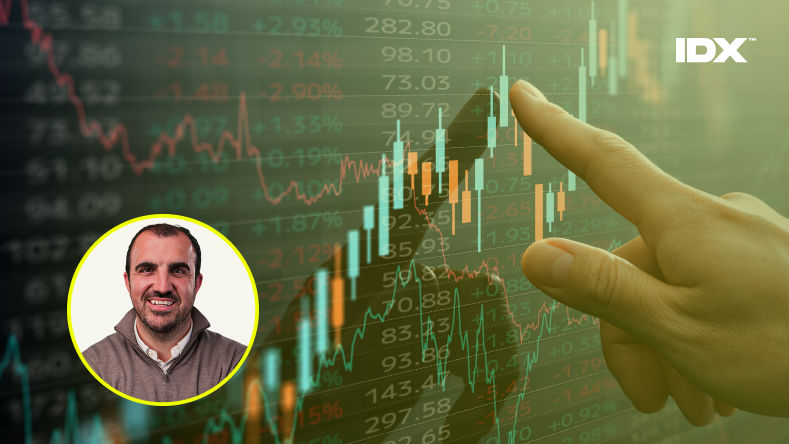 A representation of a stock exchange with an inset of Chris Corrigan